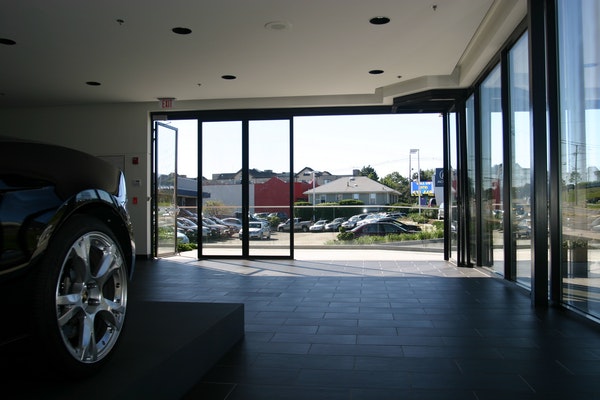 Auto showroom exterior by Shree Alusys Company